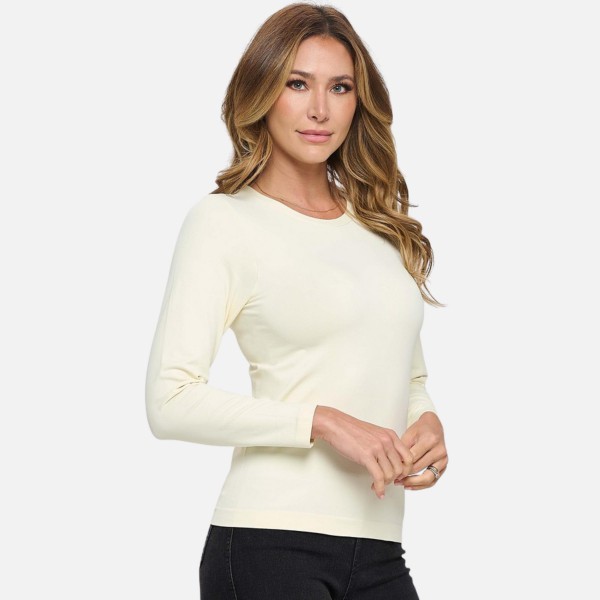 Women's Seamless Round Neck Long Sleeve Top

- Crew Neckline
- Seamless Construction
- Fitted Design
- Self Fabric Binding
- 92% Nylon, 8% Spandex