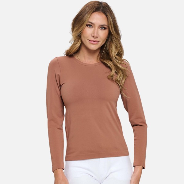 Women's Seamless Round Neck Long Sleeve Top

- Crew Neckline
- Seamless Construction
- Fitted Design
- Self Fabric Binding
- 92% Nylon, 8% Spandex