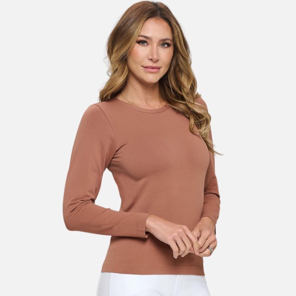 Women's Seamless Round Neck Long Sleeve Top

- Crew Neckline
- Seamless Construction
- Fitted Design
- Self Fabric Binding
- 92% Nylon, 8% Spandex