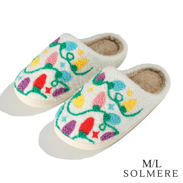 SOLMERE Slippers – Christmas Lights Slide On Slippers

Step into pure indulgence. Our Solmere Slippers blend a trend-forward design with cloud-like comfort, making every step feel like a warm embrace.

- Incredible Comfort – Lined with ultra-soft, plush material to keep your feet cozy from morning to night.

- Slip-On Ease – Effortless to wear, with a secure yet relaxed fit.

- Durable & Lightweight – Crafted for everyday wear with a cushioned sole that supports and lasts.

- US Women's Size: S/M (6-8) M/L (8-10)

- Rubber Sole - Provides grip and stability for both indoor and light outdoor use.

- Thoughtful Packaging – Each pair comes neatly displayed on a branded slipper hanger with a branded card, and individually packaged.

Once you slip them on, you’ll understand why SOLMERE slippers are love at first step.