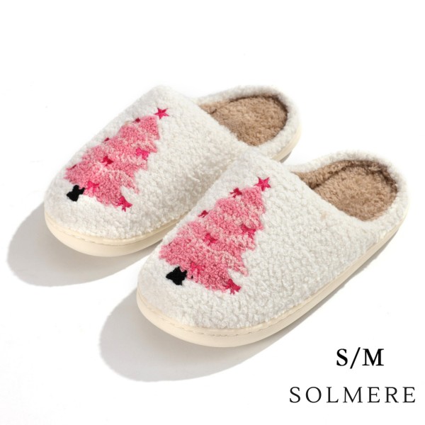 SOLMERE Slippers – Pink Christmas Tree Slide On Slippers

Step into pure indulgence. Our Solmere Slippers blend a trend-forward design with cloud-like comfort, making every step feel like a warm embrace.

- Incredible Comfort – Lined with ultra-soft, plush material to keep your feet cozy from morning to night.
- Slip-On Ease – Effortless to wear, with a secure yet relaxed fit.
- Durable & Lightweight – Crafted for everyday wear with a cushioned sole that supports and lasts.
- US Women's Size: S/M (6-8) M/L (8-10)
- Rubber Sole - Provides grip and stability for both indoor and light outdoor use.
- Thoughtful Packaging – Each pair comes neatly displayed on a branded slipper hanger with a branded card, and individually packaged.

Once you slip them on, you’ll understand why SOLMERE slippers are love at first step.