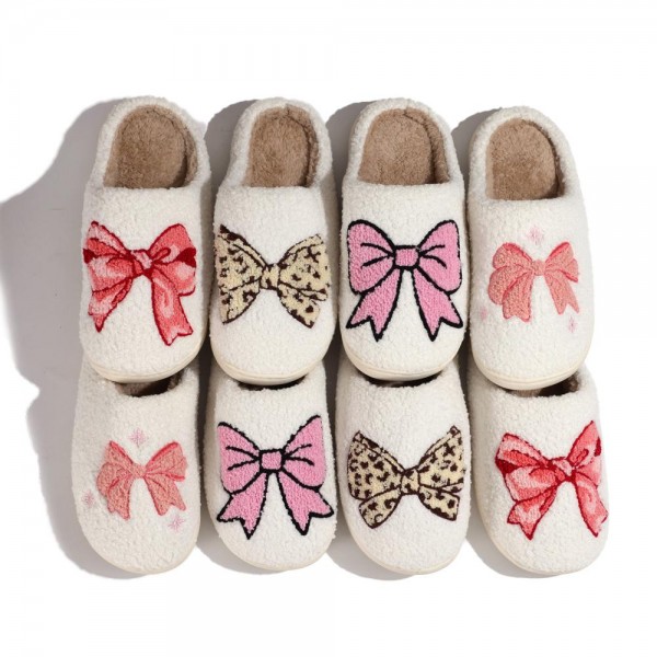 SOLMERE Slippers – Plush Bow Slide On Slippers

Step into pure indulgence. Our Solmere Slippers blend a trend-forward design with cloud-like comfort, making every step feel like a warm embrace.

- Incredible Comfort – Lined with ultra-soft, plush material to keep your feet cozy from morning to night.

- Slip-On Ease – Effortless to wear, with a secure yet relaxed fit.

- Durable & Lightweight – Crafted for everyday wear with a cushioned sole that supports and lasts.

- US Women's Size: S/M (6-8) M/L (8-10)

- Rubber Sole - Provides grip and stability for both indoor and light outdoor use.

- Thoughtful Packaging – Each pair comes neatly displayed on a branded slipper hanger with a branded card, and individually packaged.

Once you slip them on, you’ll understand why SOLMERE slippers are love at first step.