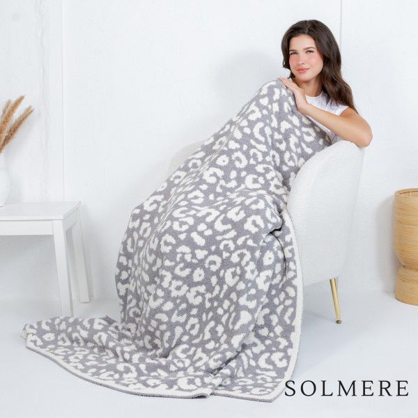 Solmere Blanket – Animal Print Blanket

Wrap yourself in pure indulgence. Our Solmere Blanket combines a fashion-forward design with an irresistibly soft hand-feel that’s as beautiful as it is cozy.

- Luxuriously Soft – Crafted from ultra-plush, high-quality fibers you’ll want to snuggle into all season long.

- Perfectly Sized – Approximately 50” W x 60” L, perfect for draping over your sofa, bed, or yourself.

- Premium Craftsmanship – 100% polyester for lasting softness, warmth, and easy care.

- Thoughtful Packaging – Each blanket is tied with a branded ribbon in a bow and includes two cards: one featuring the SOLMERE brand and another showcasing a high-quality image of the blanket’s print. Individually packaged.

Once you touch it, you’ll understand why SOLMERE blankets are love at first feel.