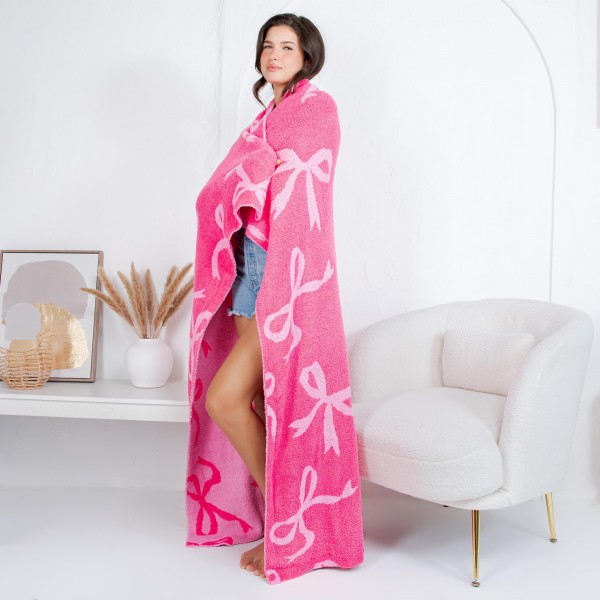 Solmere Blanket – All Over Bows Blanket

Wrap yourself in pure indulgence. Our Solmere Blanket combines a fashion-forward design with an irresistibly soft hand-feel that’s as beautiful as it is cozy.

- Luxuriously Soft – Crafted from ultra-plush, high-quality fibers you’ll want to snuggle into all season long.

- Perfectly Sized – Approximately 50” W x 60” L, perfect for draping over your sofa, bed, or yourself.

- Premium Craftsmanship – 100% polyester for lasting softness, warmth, and easy care.

- Thoughtful Packaging – Each blanket is tied with a branded ribbon in a bow and includes two cards: one featuring the SOLMERE brand and another showcasing a high-quality image of the blanket’s print. Individually packaged

Once you touch it, you’ll understand why SOLMERE blankets are love at first feel.
 