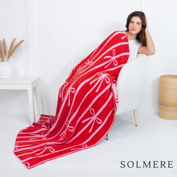 Solmere Blanket – Striped Bow Blanket

Wrap yourself in pure indulgence. Our Solmere Blanket combines a fashion-forward design with an irresistibly soft hand-feel that’s as beautiful as it is cozy.

- Luxuriously Soft – Crafted from ultra-plush, high-quality fibers you’ll want to snuggle into all season long.

- Perfectly Sized – Approximately 50” W x 60” L, perfect for draping over your sofa, bed, or yourself.

- Premium Craftsmanship – 100% polyester for lasting softness, warmth, and easy care.

- Thoughtful Packaging – Each blanket is tied with a branded ribbon in a bow and includes two cards: one featuring the SOLMERE brand and another showcasing a high-quality image of the blanket’s print. Individually packaged

Once you touch it, you’ll understand why SOLMERE blankets are love at first feel.
