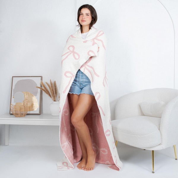 Solmere Blanket – Elegant Bow Print Blanket

Wrap yourself in pure indulgence. Our Solmere Blanket combines a fashion-forward design with an irresistibly soft hand-feel that’s as beautiful as it is cozy.

- Luxuriously Soft – Crafted from ultra-plush, high-quality fibers you’ll want to snuggle into all season long.

- Perfectly Sized – Approximately 50” W x 60” L, perfect for draping over your sofa, bed, or yourself.

- Premium Craftsmanship – 100% polyester for lasting softness, warmth, and easy care.

- Thoughtful Packaging – Each blanket is tied with a branded ribbon in a bow and includes two cards: one featuring the SOLMERE brand and another showcasing a high-quality image of the blanket’s print. Individually packaged

Once you touch it, you’ll understand why SOLMERE blankets are love at first feel.
