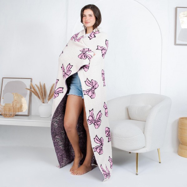 Solmere Blanket – Plush Bow Blanket

Wrap yourself in pure indulgence. Our Solmere Blanket combines a fashion-forward design with an irresistibly soft hand-feel that’s as beautiful as it is cozy.

- Luxuriously Soft – Crafted from ultra-plush, high-quality fibers you’ll want to snuggle into all season long.

- Perfectly Sized – Approximately 50” W x 60” L, perfect for draping over your sofa, bed, or yourself.

- Premium Craftsmanship – 100% polyester for lasting softness, warmth, and easy care.

- Thoughtful Packaging – Each blanket is tied with a branded ribbon in a bow and includes two cards: one featuring the SOLMERE brand and another showcasing a high-quality image of the blanket’s print. Individually packaged

Once you touch it, you’ll understand why SOLMERE blankets are love at first feel.
