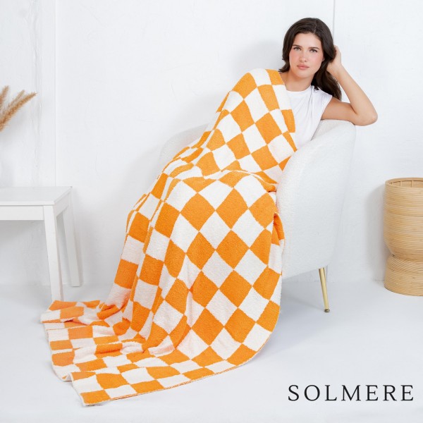 Solmere Blanket – Checkered Print Blanket

Wrap yourself in pure indulgence. Our Solmere Blanket combines a fashion-forward design with an irresistibly soft hand-feel that’s as beautiful as it is cozy.

- Luxuriously Soft – Crafted from ultra-plush, high-quality fibers you’ll want to snuggle into all season long.

- Perfectly Sized – Approximately 50” W x 60” L, perfect for draping over your sofa, bed, or yourself.

- Premium Craftsmanship – 100% polyester for lasting softness, warmth, and easy care.

- Thoughtful Packaging – Each blanket is tied with a branded ribbon in a bow and includes two cards: one featuring the SOLMERE brand and another showcasing a high-quality image of the blanket’s print. Individually packaged

Once you touch it, you’ll understand why SOLMERE blankets are love at first feel.
