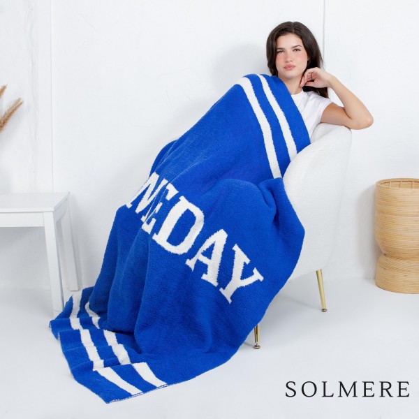 Solmere Blanket – Game Day Blanket

Wrap yourself in pure indulgence. Our Solmere Blanket combines a fashion-forward design with an irresistibly soft hand-feel that’s as beautiful as it is cozy.

- Luxuriously Soft – Crafted from ultra-plush, high-quality fibers you’ll want to snuggle into all season long.

- Perfectly Sized – Approximately 50” W x 60” L, perfect for draping over your sofa, bed, or yourself.

- Premium Craftsmanship – 100% polyester for lasting softness, warmth, and easy care.

- Thoughtful Packaging – Each blanket is tied with a branded ribbon in a bow and includes two cards: one featuring the SOLMERE brand and another showcasing a high-quality image of the blanket’s print. Individually packaged

Once you touch it, you’ll understand why SOLMERE blankets are love at first feel.
