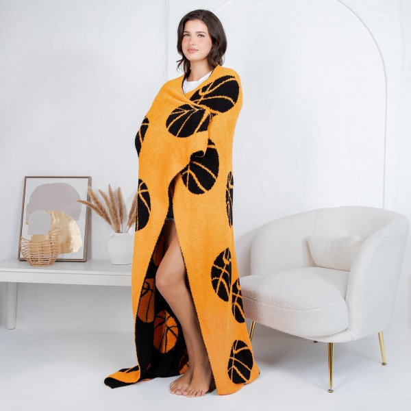 Solmere Blanket – Sports Ball Print Blanket

Wrap yourself in pure indulgence. Our Solmere Blanket combines a fashion-forward design with an irresistibly soft hand-feel that’s as beautiful as it is cozy.

- Luxuriously Soft – Crafted from ultra-plush, high-quality fibers you’ll want to snuggle into all season long.

- Perfectly Sized – Approximately 50” W x 60” L, perfect for draping over your sofa, bed, or yourself.

- Premium Craftsmanship – 100% polyester for lasting softness, warmth, and easy care.

- Thoughtful Packaging – Each blanket is tied with a branded ribbon in a bow and includes two cards: one featuring the SOLMERE brand and another showcasing a high-quality image of the blanket’s print. Individually packaged

Once you touch it, you’ll understand why SOLMERE blankets are love at first feel.
