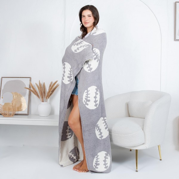 Solmere Blanket – Sports Ball Print Blanket

Wrap yourself in pure indulgence. Our Solmere Blanket combines a fashion-forward design with an irresistibly soft hand-feel that’s as beautiful as it is cozy.

- Luxuriously Soft – Crafted from ultra-plush, high-quality fibers you’ll want to snuggle into all season long.

- Perfectly Sized – Approximately 50” W x 60” L, perfect for draping over your sofa, bed, or yourself.

- Premium Craftsmanship – 100% polyester for lasting softness, warmth, and easy care.

- Thoughtful Packaging – Each blanket is tied with a branded ribbon in a bow and includes two cards: one featuring the SOLMERE brand and another showcasing a high-quality image of the blanket’s print. Individually packaged

Once you touch it, you’ll understand why SOLMERE blankets are love at first feel.
