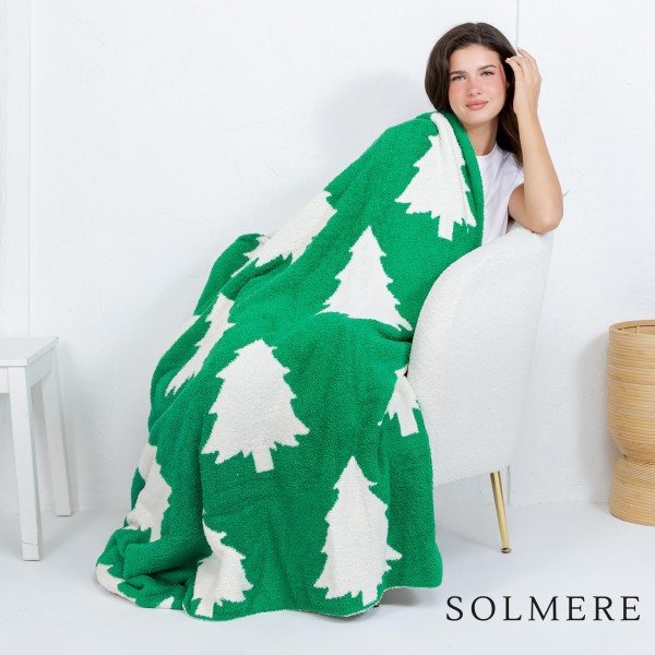 Solmere Blanket – Christmas Tree Blanket

Wrap yourself in pure indulgence. Our Solmere Blanket combines a fashion-forward design with an irresistibly soft hand-feel that’s as beautiful as it is cozy.

- Luxuriously Soft – Crafted from ultra-plush, high-quality fibers you’ll want to snuggle into all season long.

- Perfectly Sized – Approximately 50” W x 60” L, perfect for draping over your sofa, bed, or yourself.

- Premium Craftsmanship – 100% polyester for lasting softness, warmth, and easy care.

- Thoughtful Packaging – Each blanket is tied with a branded ribbon in a bow and includes two cards: one featuring the SOLMERE brand and another showcasing a high-quality image of the blanket’s print. Individually packaged

Once you touch it, you’ll understand why SOLMERE blankets are love at first feel.
