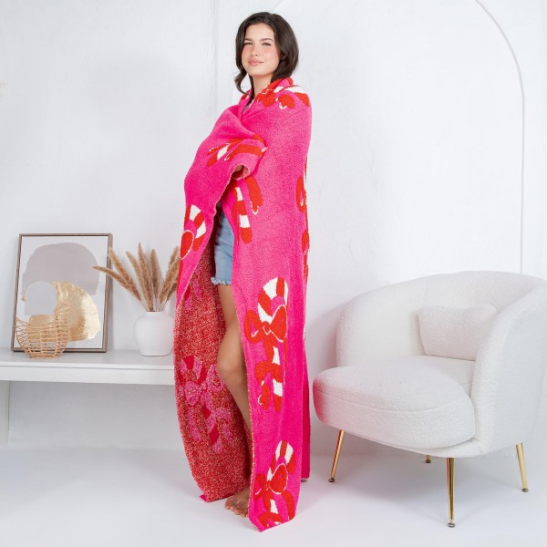 Solmere Blanket – Christmas Candy Cane Bow Blanket

Wrap yourself in pure indulgence. Our Solmere Blanket combines a fashion-forward design with an irresistibly soft hand-feel that’s as beautiful as it is cozy.

- Luxuriously Soft – Crafted from ultra-plush, high-quality fibers you’ll want to snuggle into all season long.

- Perfectly Sized – Approximately 50” W x 60” L, perfect for draping over your sofa, bed, or yourself.

- Premium Craftsmanship – 100% polyester for lasting softness, warmth, and easy care.

- Thoughtful Packaging – Each blanket is tied with a branded ribbon in a bow and includes two cards: one featuring the SOLMERE brand and another showcasing a high-quality image of the blanket’s print. Individually packaged

Once you touch it, you’ll understand why SOLMERE blankets are love at first feel.
