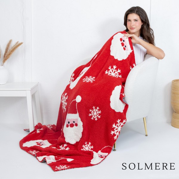 Solmere Blanket – Santa Blanket

Wrap yourself in pure indulgence. Our Solmere Blanket combines a fashion-forward design with an irresistibly soft hand-feel that’s as beautiful as it is cozy.

- Luxuriously Soft – Crafted from ultra-plush, high-quality fibers you’ll want to snuggle into all season long.

- Perfectly Sized – Approximately 50” W x 60” L, perfect for draping over your sofa, bed, or yourself.

- Premium Craftsmanship – 100% polyester for lasting softness, warmth, and easy care.

- Thoughtful Packaging – Each blanket is tied with a branded ribbon in a bow and includes two cards: one featuring the SOLMERE brand and another showcasing a high-quality image of the blanket’s print. Individually packaged

Once you touch it, you’ll understand why SOLMERE blankets are love at first feel.
