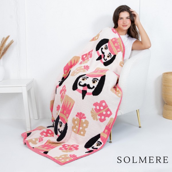 Solmere Blanket – Christmas Candy Cane with Green Bow Blanket

Wrap yourself in pure indulgence. Our Solmere Blanket combines a fashion-forward design with an irresistibly soft hand-feel that’s as beautiful as it is cozy.

- Luxuriously Soft – Crafted from ultra-plush, high-quality fibers you’ll want to snuggle into all season long.

- Perfectly Sized – Approximately 50” W x 60” L, perfect for draping over your sofa, bed, or yourself.

- Premium Craftsmanship – 100% polyester for lasting softness, warmth, and easy care.

- Thoughtful Packaging – Each blanket is tied with a branded ribbon in a bow and includes two cards: one featuring the SOLMERE brand and another showcasing a high-quality image of the blanket’s print. Individually packaged

Once you touch it, you’ll understand why SOLMERE blankets are love at first feel.
