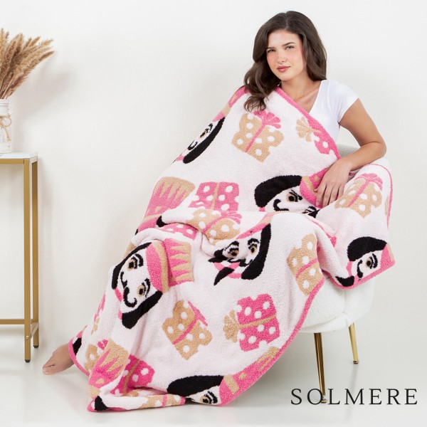 Solmere Blanket – Nutcracker Blanket

Wrap yourself in pure indulgence. Our Solmere Blanket combines a fashion-forward design with an irresistibly soft hand-feel that’s as beautiful as it is cozy.

- Luxuriously Soft – Crafted from ultra-plush, high-quality fibers you’ll want to snuggle into all season long.

- Perfectly Sized – Approximately 50” W x 60” L, perfect for draping over your sofa, bed, or yourself.

- Premium Craftsmanship – 100% polyester for lasting softness, warmth, and easy care.

- Thoughtful Packaging – Each blanket is tied with a branded ribbon in a bow and includes two cards: one featuring the SOLMERE brand and another showcasing a high-quality image of the blanket’s print. Individually packaged

Once you touch it, you’ll understand why SOLMERE blankets are love at first feel.

