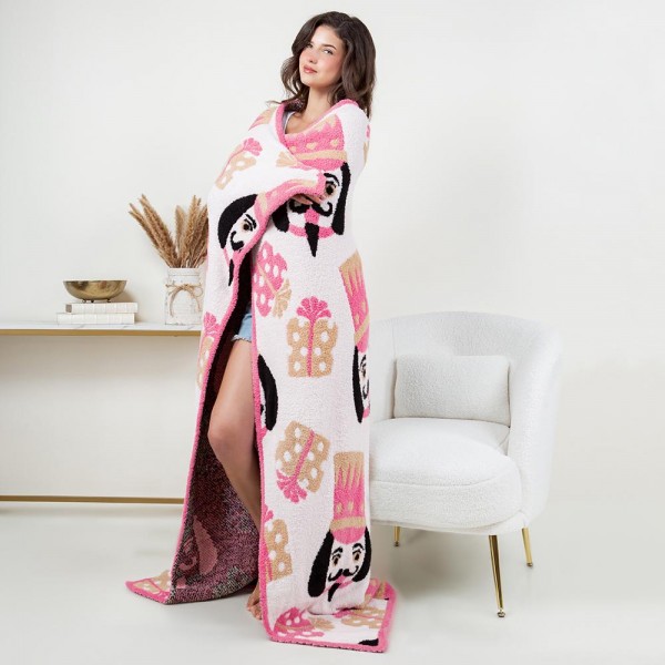 Solmere Blanket – Nutcracker Blanket

Wrap yourself in pure indulgence. Our Solmere Blanket combines a fashion-forward design with an irresistibly soft hand-feel that’s as beautiful as it is cozy.

- Luxuriously Soft – Crafted from ultra-plush, high-quality fibers you’ll want to snuggle into all season long.

- Perfectly Sized – Approximately 50” W x 60” L, perfect for draping over your sofa, bed, or yourself.

- Premium Craftsmanship – 100% polyester for lasting softness, warmth, and easy care.

- Thoughtful Packaging – Each blanket is tied with a branded ribbon in a bow and includes two cards: one featuring the SOLMERE brand and another showcasing a high-quality image of the blanket’s print. Individually packaged

Once you touch it, you’ll understand why SOLMERE blankets are love at first feel.

