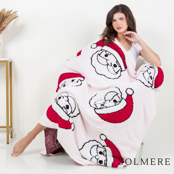 Solmere Blanket – Santa Blanket

Wrap yourself in pure indulgence. Our Solmere Blanket combines a fashion-forward design with an irresistibly soft hand-feel that’s as beautiful as it is cozy.

- Luxuriously Soft – Crafted from ultra-plush, high-quality fibers you’ll want to snuggle into all season long.

- Perfectly Sized – Approximately 50” W x 60” L, perfect for draping over your sofa, bed, or yourself.

- Premium Craftsmanship – 100% polyester for lasting softness, warmth, and easy care.

- Thoughtful Packaging – Each blanket is tied with a branded ribbon in a bow and includes two cards: one featuring the SOLMERE brand and another showcasing a high-quality image of the blanket’s print. Individually packaged

Once you touch it, you’ll understand why SOLMERE blankets are love at first feel.

