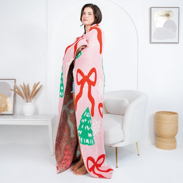 Solmere Blanket – Christmas Tree & Bows Blanket

Wrap yourself in pure indulgence. Our Solmere Blanket combines a fashion-forward design with an irresistibly soft hand-feel that’s as beautiful as it is cozy.

- Luxuriously Soft – Crafted from ultra-plush, high-quality fibers you’ll want to snuggle into all season long.

- Perfectly Sized – Approximately 50” W x 60” L, perfect for draping over your sofa, bed, or yourself.

- Premium Craftsmanship – 100% polyester for lasting softness, warmth, and easy care.

- Thoughtful Packaging – Each blanket is tied with a branded ribbon in a bow and includes two cards: one featuring the SOLMERE brand and another showcasing a high-quality image of the blanket’s print. Individually packaged

Once you touch it, you’ll understand why SOLMERE blankets are love at first feel.
