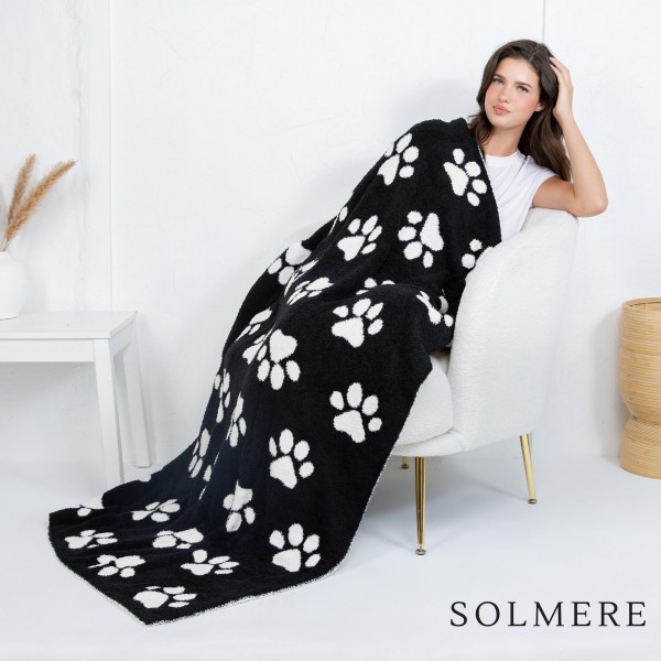 Solmere Blanket – Paw Print Blanket

Wrap yourself in pure indulgence. Our Solmere Blanket combines a fashion-forward design with an irresistibly soft hand-feel that’s as beautiful as it is cozy.

- Luxuriously Soft – Crafted from ultra-plush, high-quality fibers you’ll want to snuggle into all season long.

- Perfectly Sized – Approximately 50” W x 60” L, perfect for draping over your sofa, bed, or yourself.

- Premium Craftsmanship – 100% polyester for lasting softness, warmth, and easy care.

- Thoughtful Packaging – Each blanket is tied with a branded ribbon in a bow and includes two cards: one featuring the SOLMERE brand and another showcasing a high-quality image of the blanket’s print. Individually packaged

Once you touch it, you’ll understand why SOLMERE blankets are love at first feel.