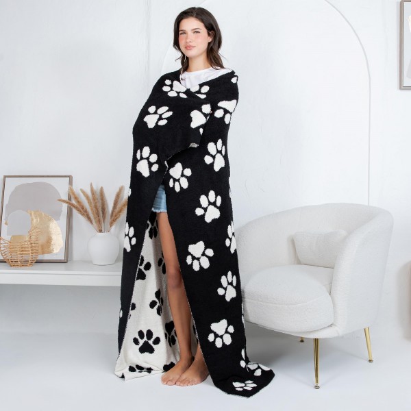 Solmere Blanket – Paw Print Blanket

Wrap yourself in pure indulgence. Our Solmere Blanket combines a fashion-forward design with an irresistibly soft hand-feel that’s as beautiful as it is cozy.

- Luxuriously Soft – Crafted from ultra-plush, high-quality fibers you’ll want to snuggle into all season long.

- Perfectly Sized – Approximately 50” W x 60” L, perfect for draping over your sofa, bed, or yourself.

- Premium Craftsmanship – 100% polyester for lasting softness, warmth, and easy care.

- Thoughtful Packaging – Each blanket is tied with a branded ribbon in a bow and includes two cards: one featuring the SOLMERE brand and another showcasing a high-quality image of the blanket’s print. Individually packaged

Once you touch it, you’ll understand why SOLMERE blankets are love at first feel.