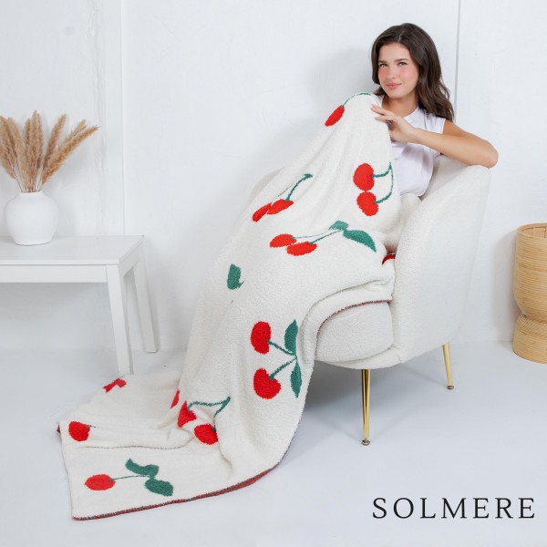 Solmere Blanket – Cherry Print Blanket

Wrap yourself in pure indulgence. Our Solmere Blanket combines a fashion-forward design with an irresistibly soft hand-feel that’s as beautiful as it is cozy.

- Luxuriously Soft – Crafted from ultra-plush, high-quality fibers you’ll want to snuggle into all season long.

- Perfectly Sized – Approximately 50” W x 60” L, perfect for draping over your sofa, bed, or yourself.

- Premium Craftsmanship – 100% polyester for lasting softness, warmth, and easy care.

- Thoughtful Packaging – Each blanket is tied with a branded ribbon in a bow and includes two cards: one featuring the SOLMERE brand and another showcasing a high-quality image of the blanket’s print. Individually packaged

Once you touch it, you’ll understand why SOLMERE blankets are love at first feel.
