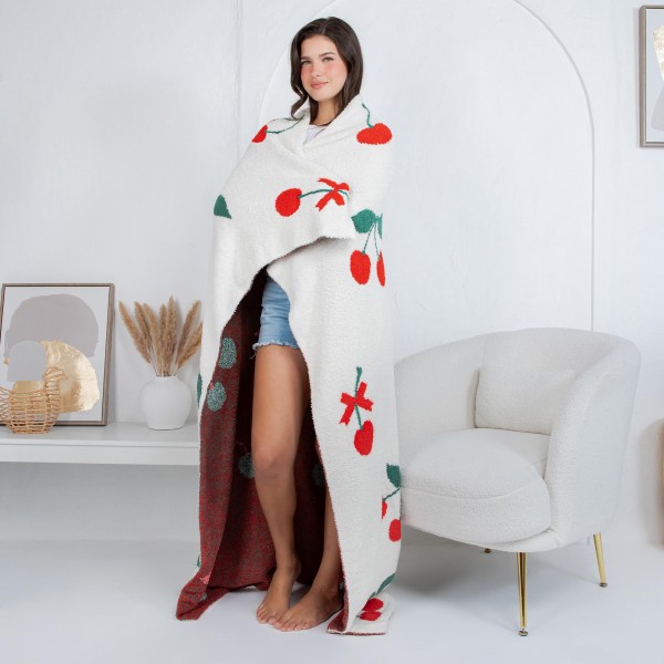 Solmere Blanket – Cherry Print Blanket

Wrap yourself in pure indulgence. Our Solmere Blanket combines a fashion-forward design with an irresistibly soft hand-feel that’s as beautiful as it is cozy.

- Luxuriously Soft – Crafted from ultra-plush, high-quality fibers you’ll want to snuggle into all season long.

- Perfectly Sized – Approximately 50” W x 60” L, perfect for draping over your sofa, bed, or yourself.

- Premium Craftsmanship – 100% polyester for lasting softness, warmth, and easy care.

- Thoughtful Packaging – Each blanket is tied with a branded ribbon in a bow and includes two cards: one featuring the SOLMERE brand and another showcasing a high-quality image of the blanket’s print. Individually packaged

Once you touch it, you’ll understand why SOLMERE blankets are love at first feel.
