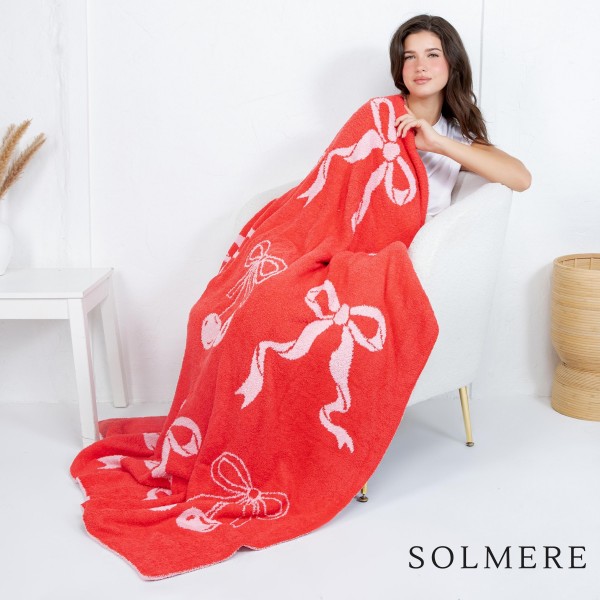 Solmere Blanket – Cherries & Bow Blanket

Wrap yourself in pure indulgence. Our Solmere Blanket combines a fashion-forward design with an irresistibly soft hand-feel that’s as beautiful as it is cozy.

- Luxuriously Soft – Crafted from ultra-plush, high-quality fibers you’ll want to snuggle into all season long.

- Perfectly Sized – Approximately 50” W x 60” L, perfect for draping over your sofa, bed, or yourself.

- Premium Craftsmanship – 100% polyester for lasting softness, warmth, and easy care.

- Thoughtful Packaging – Each blanket is tied with a branded ribbon in a bow and includes two cards: one featuring the SOLMERE brand and another showcasing a high-quality image of the blanket’s print. Individually packaged

Once you touch it, you’ll understand why SOLMERE blankets are love at first feel.
