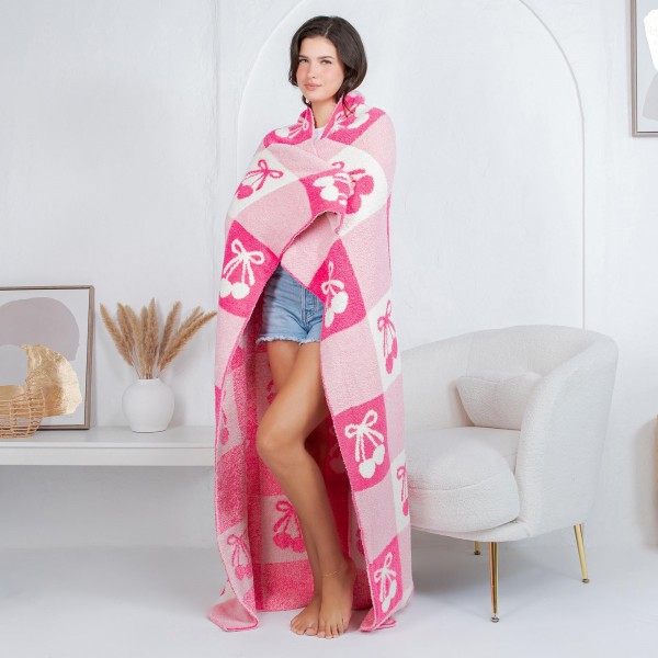 Solmere Blanket – Pink Checkered Bows & Cherries Blanket

Wrap yourself in pure indulgence. Our Solmere Blanket combines a fashion-forward design with an irresistibly soft hand-feel that’s as beautiful as it is cozy.

- Luxuriously Soft – Crafted from ultra-plush, high-quality fibers you’ll want to snuggle into all season long.

- Perfectly Sized – Approximately 50” W x 60” L, perfect for draping over your sofa, bed, or yourself.

- Premium Craftsmanship – 100% polyester for lasting softness, warmth, and easy care.

- Thoughtful Packaging – Each blanket is tied with a branded ribbon in a bow and includes two cards: one featuring the SOLMERE brand and another showcasing a high-quality image of the blanket’s print. Individually packaged

Once you touch it, you’ll understand why SOLMERE blankets are love at first feel.
