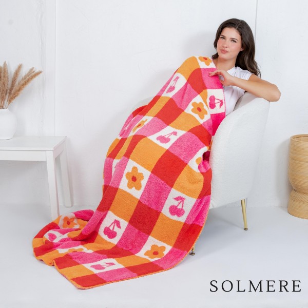 Solmere Blanket – Checkered Flowers & Cherries Blanket

Wrap yourself in pure indulgence. Our Solmere Blanket combines a fashion-forward design with an irresistibly soft hand-feel that’s as beautiful as it is cozy.

- Luxuriously Soft – Crafted from ultra-plush, high-quality fibers you’ll want to snuggle into all season long.

- Perfectly Sized – Approximately 50” W x 60” L, perfect for draping over your sofa, bed, or yourself.

- Premium Craftsmanship – 100% polyester for lasting softness, warmth, and easy care.

- Thoughtful Packaging – Each blanket is tied with a branded ribbon in a bow and includes two cards: one featuring the SOLMERE brand and another showcasing a high-quality image of the blanket’s print. Individually packaged

Once you touch it, you’ll understand why SOLMERE blankets are love at first feel.

