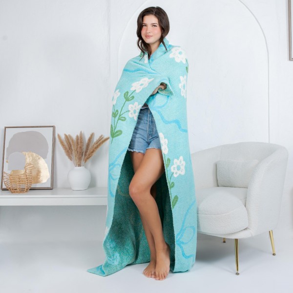Solmere Blanket – Flowers & Bows Blanket

Wrap yourself in pure indulgence. Our Solmere Blanket combines a fashion-forward design with an irresistibly soft hand-feel that’s as beautiful as it is cozy.

- Luxuriously Soft – Crafted from ultra-plush, high-quality fibers you’ll want to snuggle into all season long.

- Perfectly Sized – Approximately 50” W x 60” L, perfect for draping over your sofa, bed, or yourself.

- Premium Craftsmanship – 100% polyester for lasting softness, warmth, and easy care.

- Thoughtful Packaging – Each blanket is tied with a branded ribbon in a bow and includes two cards: one featuring the SOLMERE brand and another showcasing a high-quality image of the blanket’s print. Individually packaged

Once you touch it, you’ll understand why SOLMERE blankets are love at first feel.
