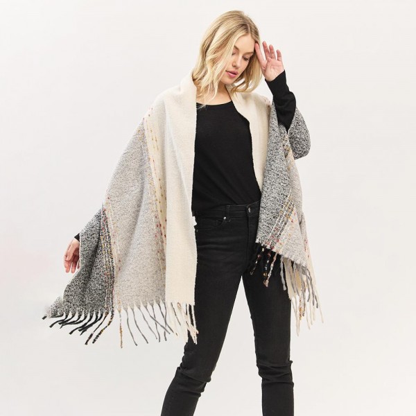 Fuzzy Knit Scarf With Multi Color Stitch & Tassel Details

- One Size
- Approximately 24" W X 69" L
- 100% Polyester