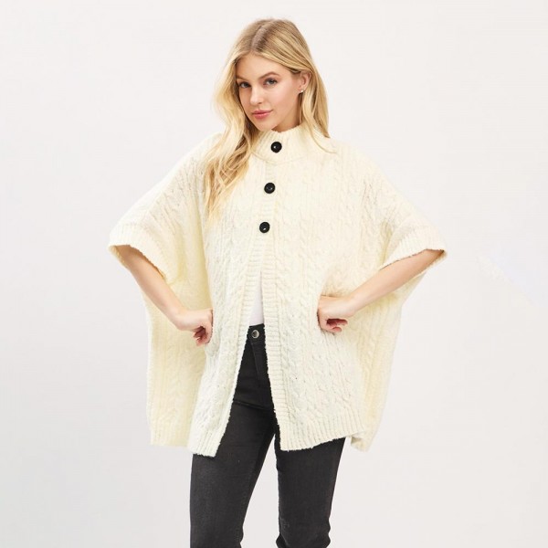 Cable Knit Button Up Cape 

- One Size Fits Most (0-14)
- 100% Polyester 