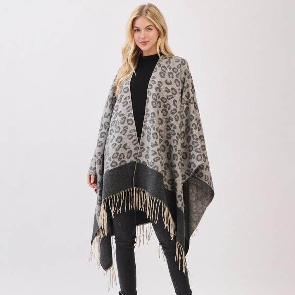 Leopard Print Ruana With Fringe Detail  

- One Size Fits Most (0-14)
- 100% Polyester 