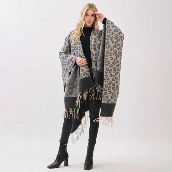 Leopard Print Ruana With Fringe Detail  

- One Size Fits Most (0-14)
- 100% Polyester 