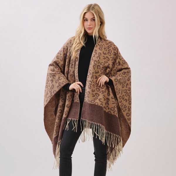 Leopard Print Ruana With Fringe Detail  

- One Size Fits Most (0-14)
- 100% Polyester 