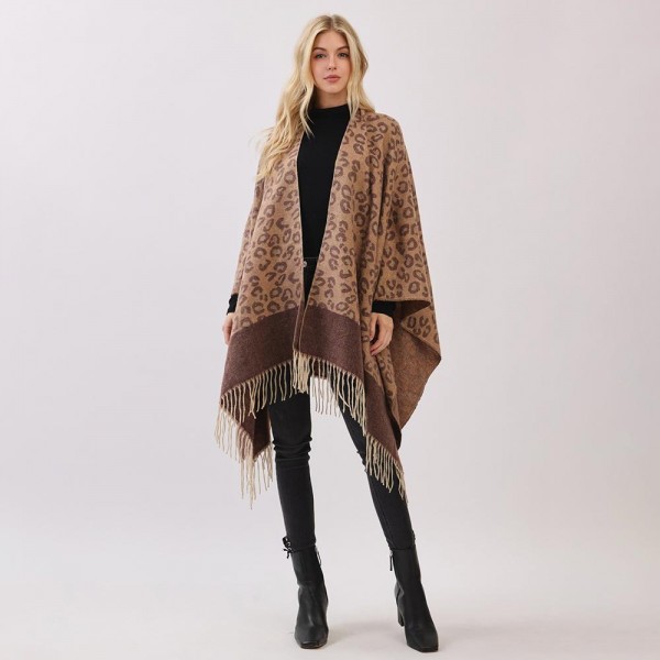 Leopard Print Ruana With Fringe Detail  

- One Size Fits Most (0-14)
- 100% Polyester 