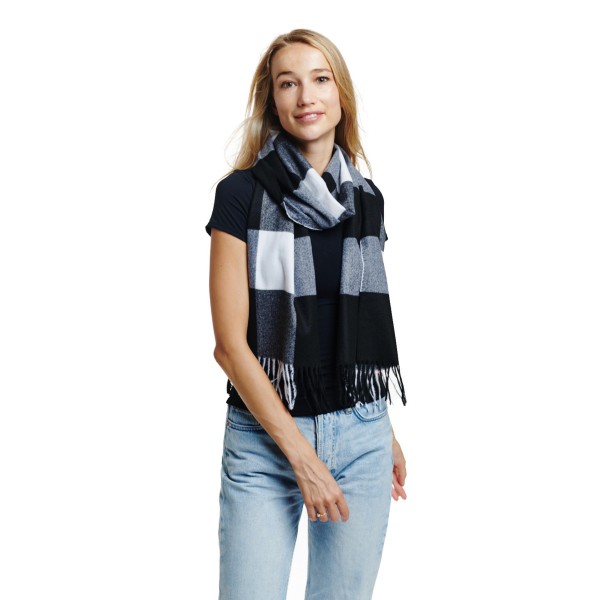 Soft Plaid Scarf With Tassel Detail

- One Size
- Approximately 13" W X 72" L
- 100% Polyester