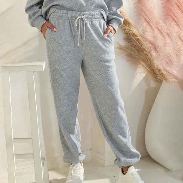Women’s Corduroy Jogger Pants

- Stretch Knit Corduroy Fabric
- Two Pockets on the Side
- Elastic Waist with Drawstring
- Ribbed
- Pull up style
- Imported
- 98% polyester 2% spandex