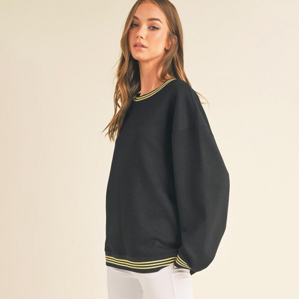 Women’s Striped Trim Crewneck UltraComfy Sweatshirt

- Crewneck
- Striped trim
- Oversized
- Casual, relaxed fit
- Side Pockets
- Soft & comfortable
- 45% Rayon, 47% Polyester, 8% Spandex