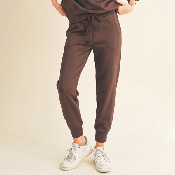 Women’s Sporty Chic UltraComfy Joggers

- Drawstring
- Two pockets
- Solid color
- Elasticized waistband
- Stretchy
- Comfortable and relaxed fit
- Imported
- 40% Terylene 55% Rayon 5% Spandex