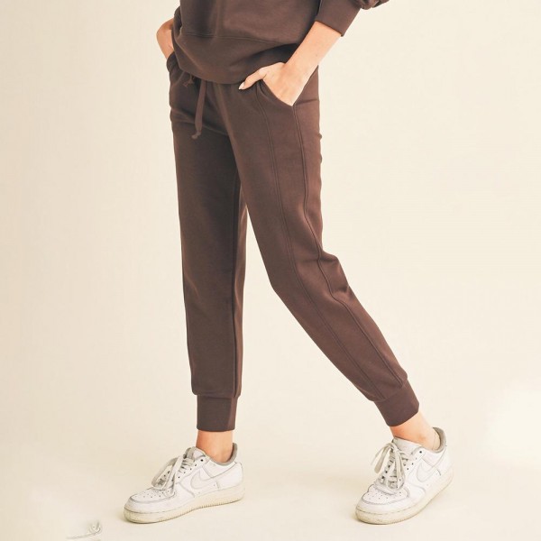 Women’s Sporty Chic UltraComfy Joggers

- Drawstring
- Two pockets
- Solid color
- Elasticized waistband
- Stretchy
- Comfortable and relaxed fit
- Imported
- 40% Terylene 55% Rayon 5% Spandex