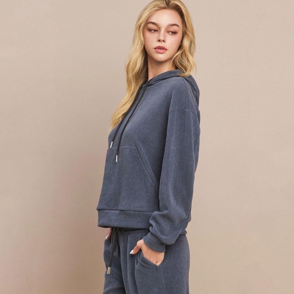 Women's Relaxed Ribbed Corduroy Hoodie

- Stretch Knit Corduroy Fabric
- Kangaroo Pocket
- Patch Pocket
- Adjustable Hood with Drawstring
- Dropped Shoulder
- Imported
- 98% polyester 2% spandex