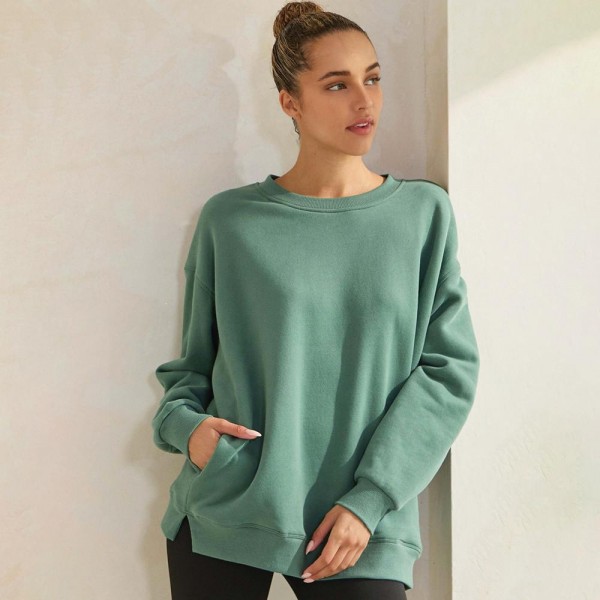Women's Cozy Fleece Oversized Sweatshirt

- Soft fleece fabric
- Dropped shoulder
- Oversized silhouette
- Practical side seam pocket
- Matching color rib neckline, sleeve cuffs, and hem band
- Imported
- 97% Cotton 3% Spandex
