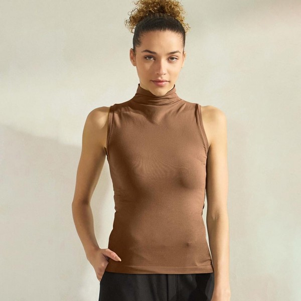 Women's Mock Neck Seamless Sleeveless Tank

•Seamless Mock Neck
•Self Fabric Armhole Band
•Bra-friendly Tank
• Imported
•92% Nylon, 8% Spandex