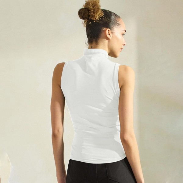 Women's Mock Neck Seamless Sleeveless Tank

•Seamless Mock Neck
•Self Fabric Armhole Band
•Bra-friendly Tank
• Imported
•92% Nylon, 8% Spandex