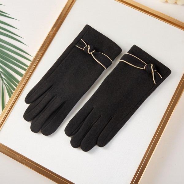 Fuzzy Knit Gloves With Knot Detail 

- One Size Fits Most 
- 100% Polyester 
