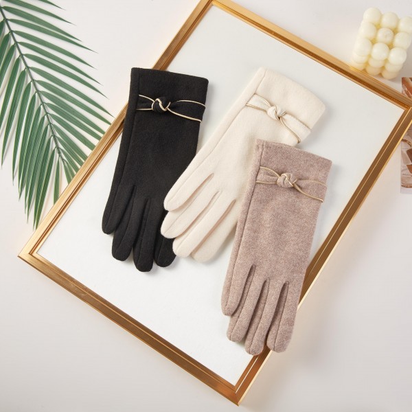 Fuzzy Knit Gloves With Knot Detail 

- One Size Fits Most 
- 100% Polyester 