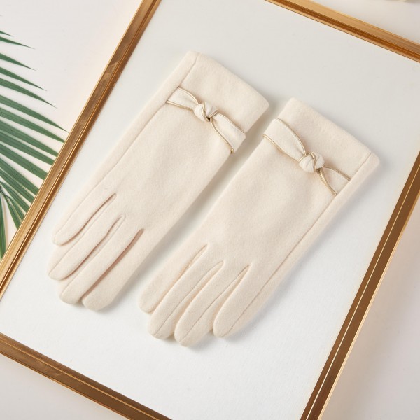 Fuzzy Knit Gloves With Knot Detail 

- One Size Fits Most 
- 100% Polyester 