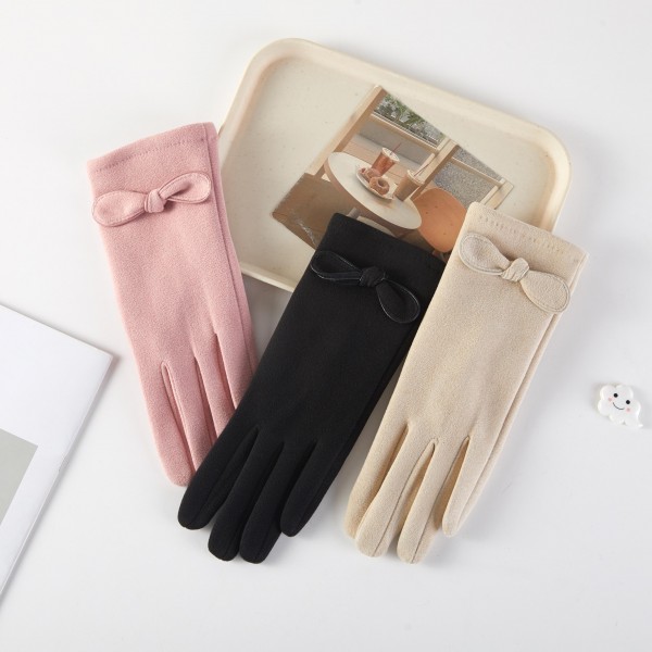 Soft Knit Gloves Featuring Bow Accent 

- One Size Fits 
- 100% Polyester 